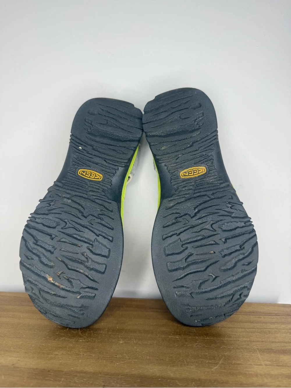 women's Keen Whisper sandals in a neutral gray and bright green colorway